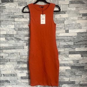 A dark orange and dark green summer dress